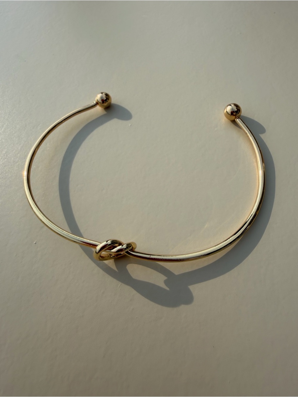 Gold-Tone Stainless Steel Love Knot Adjustable Bangle